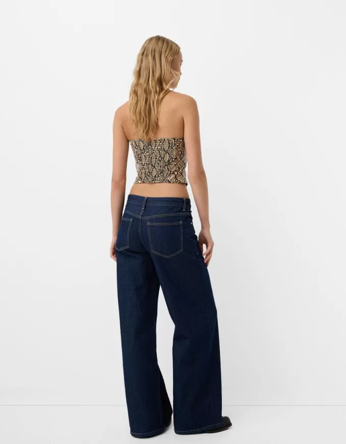 Top ispirato alla corsetteria con stampa animalier effetto pelle