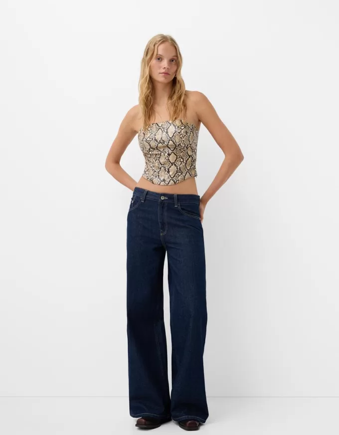 Top ispirato alla corsetteria con stampa animalier effetto pelle