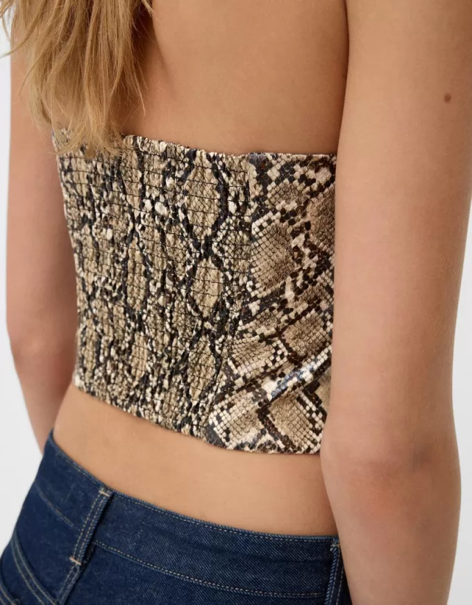 Top ispirato alla corsetteria con stampa animalier effetto pelle