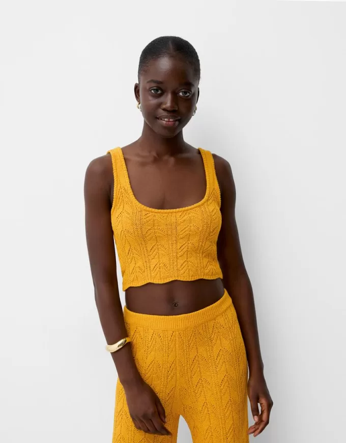 Top rustico con spalline in maglia aperta