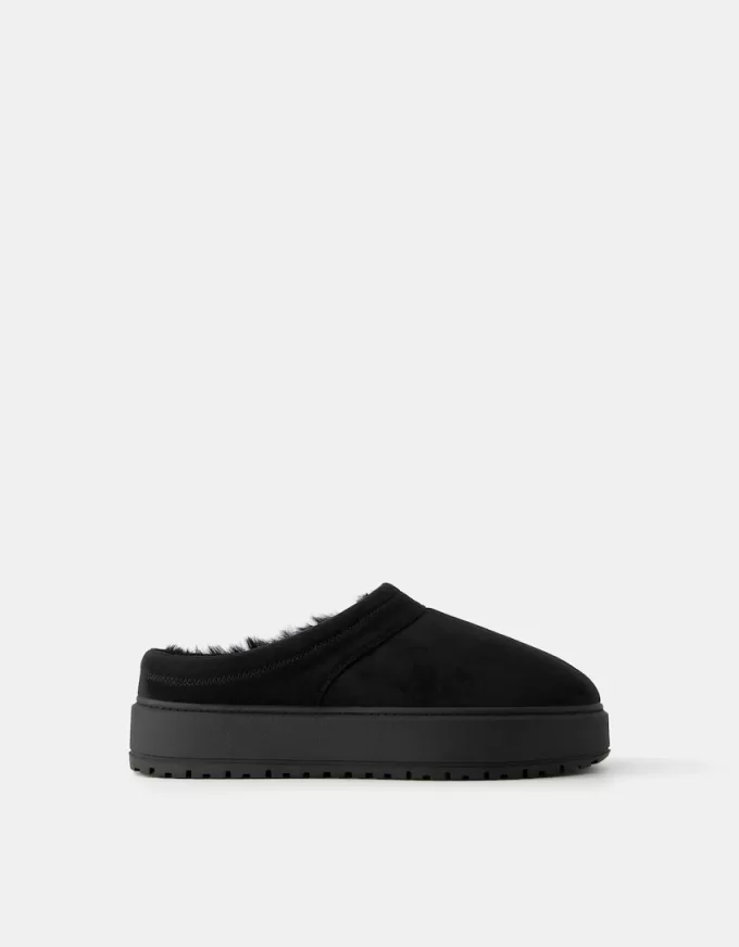 Zoccoli con plateau e fodera in pelliccia sintetica