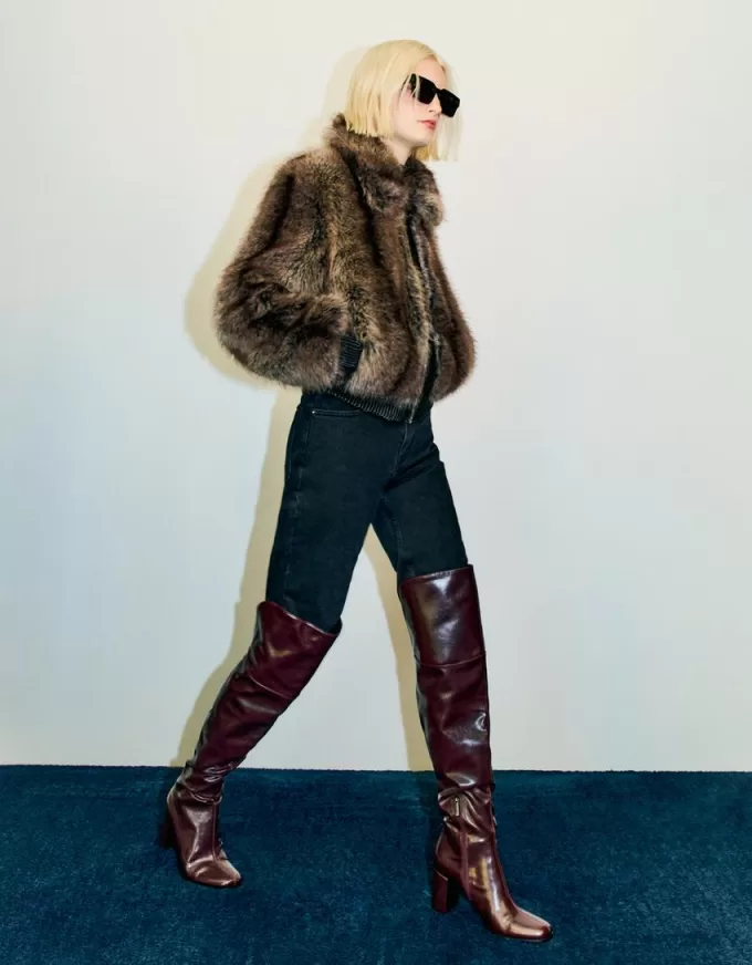 stivali sopra il ginocchio con tacco alto